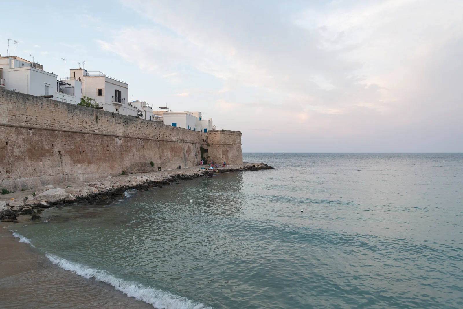 Monopoli’s old town walls beside the sea at Cala Porta Vecchia