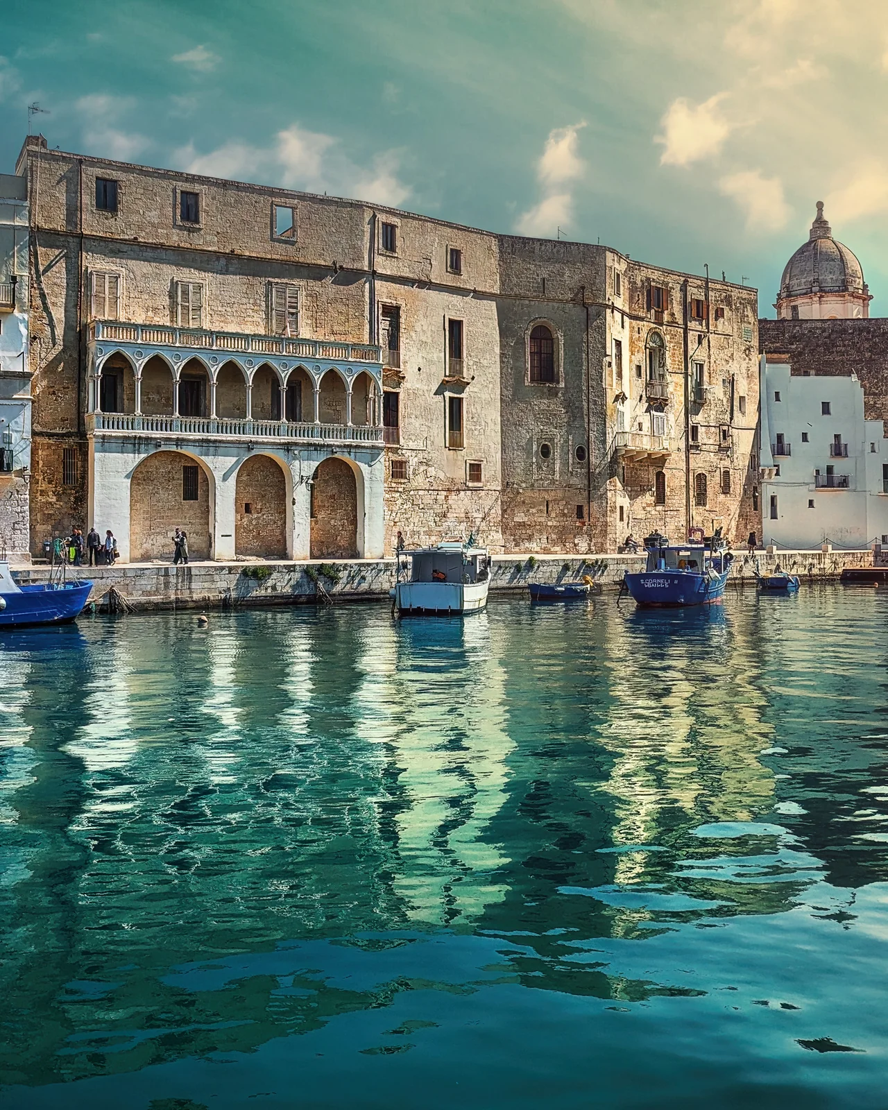Boats and reflections in Monopoli’s old harbour